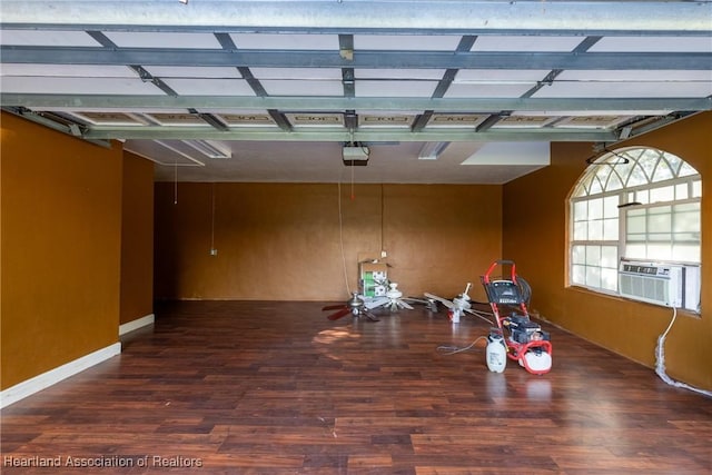 garage with cooling unit and a garage door opener