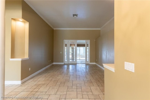 unfurnished room featuring ornamental molding