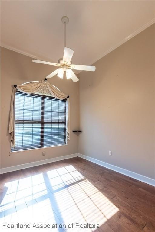 spare room with wood-type flooring, ceiling fan, and ornamental molding