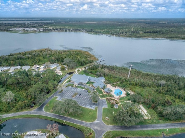 birds eye view of property featuring a water view