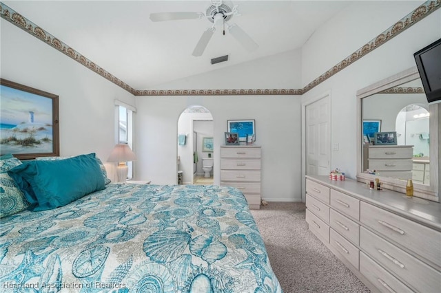 carpeted bedroom with ceiling fan and lofted ceiling