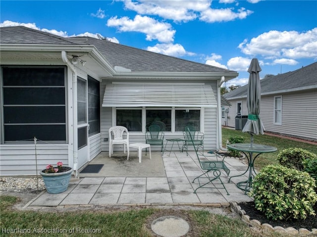 rear view of property with a patio area