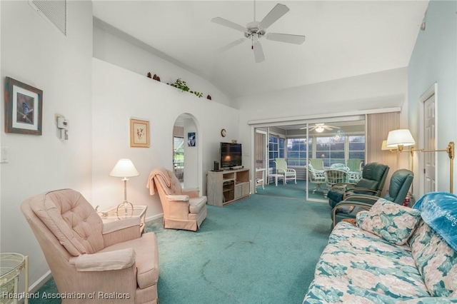 living room featuring carpet flooring, ceiling fan, and lofted ceiling