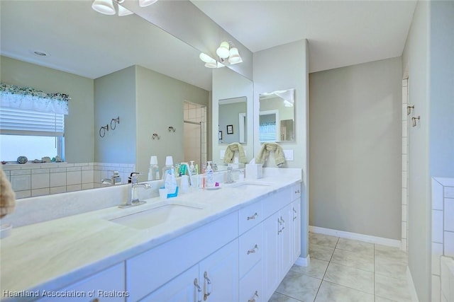 bathroom featuring vanity, tile patterned floors, and an enclosed shower