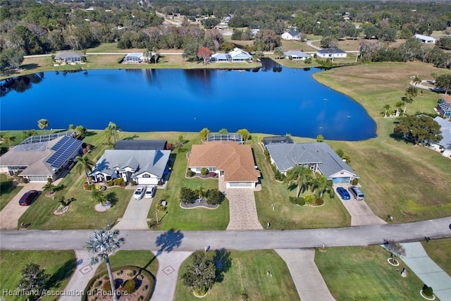 bird's eye view with a water view