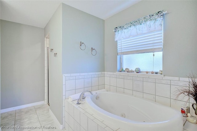 bathroom featuring tile patterned floors and independent shower and bath