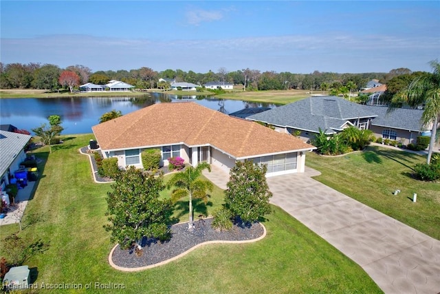 drone / aerial view with a water view