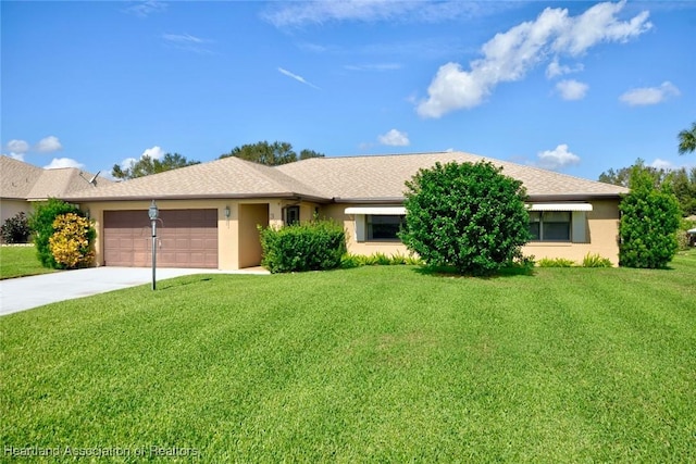 ranch-style home featuring a front lawn and a garage