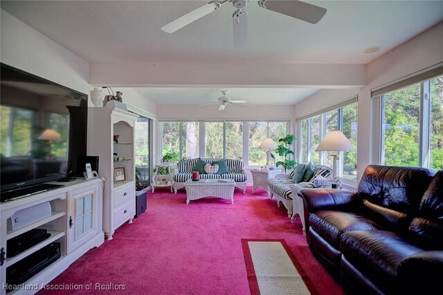 carpeted living room featuring high vaulted ceiling and ceiling fan