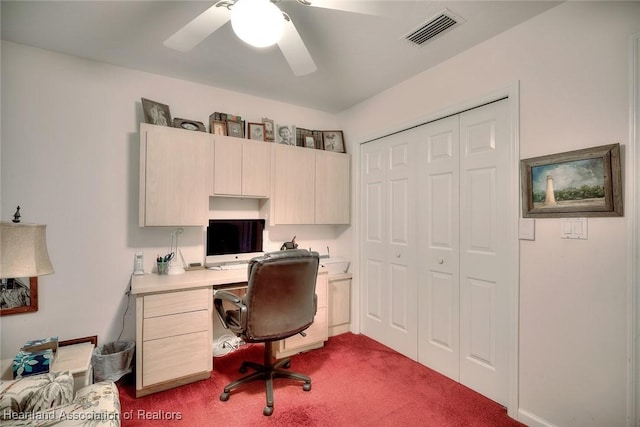 3171 E Pebble Dr, Avon Park, FL 33825 - home office with a ceiling fan, dark colored carpet, and visible vents