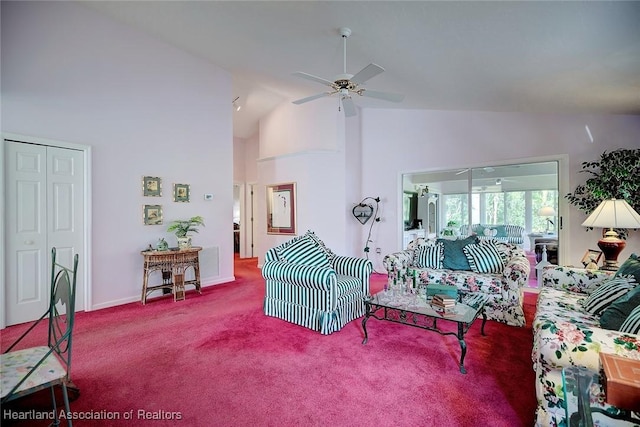 3171 E Pebble Dr, Avon Park, FL 33825 - living area with baseboards, a ceiling fan, high vaulted ceiling, and carpet