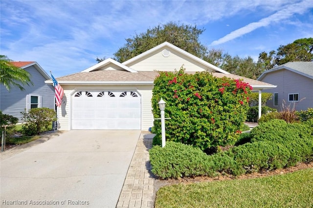 3171 E Pebble Dr, Avon Park, FL 33825 - ranch-style house with driveway, an attached garage, and roof with shingles