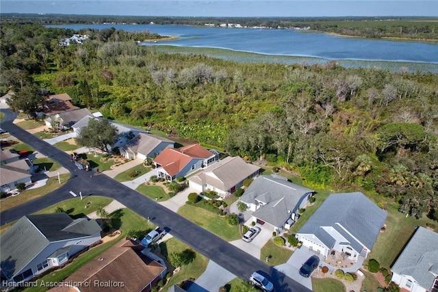 3171 E Pebble Dr, Avon Park, FL 33825 - aerial view featuring a water view, a view of trees, and a residential view