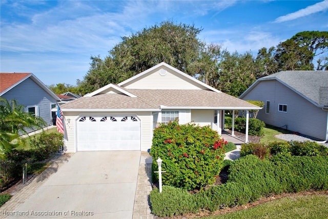 view of front of property with a garage