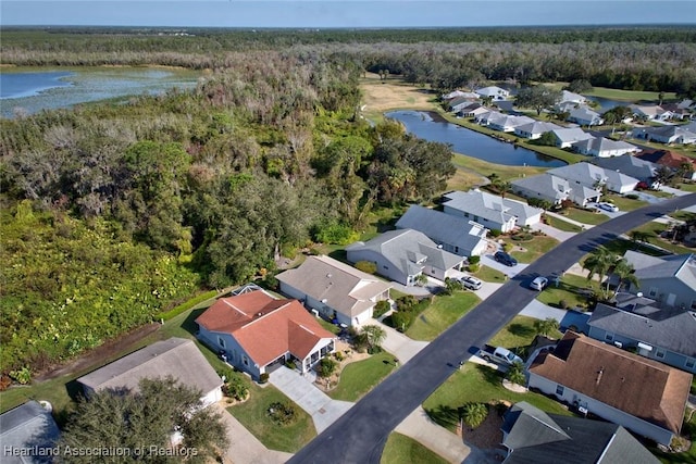 3171 E Pebble Dr, Avon Park, FL 33825 - drone / aerial view with a water view and a residential view