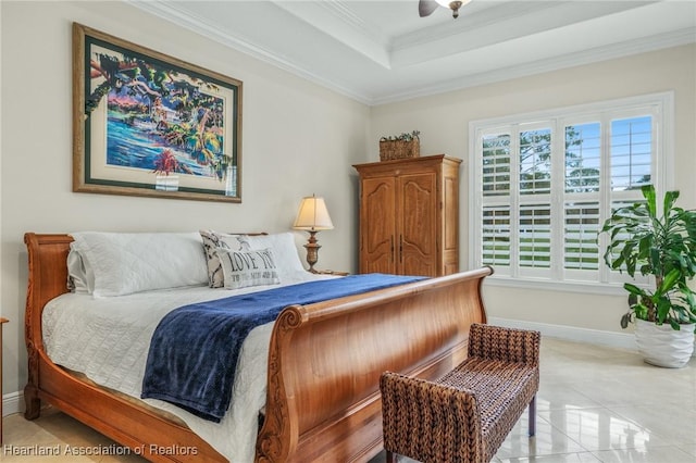 bedroom with a tray ceiling, light tile patterned floors, and ornamental molding