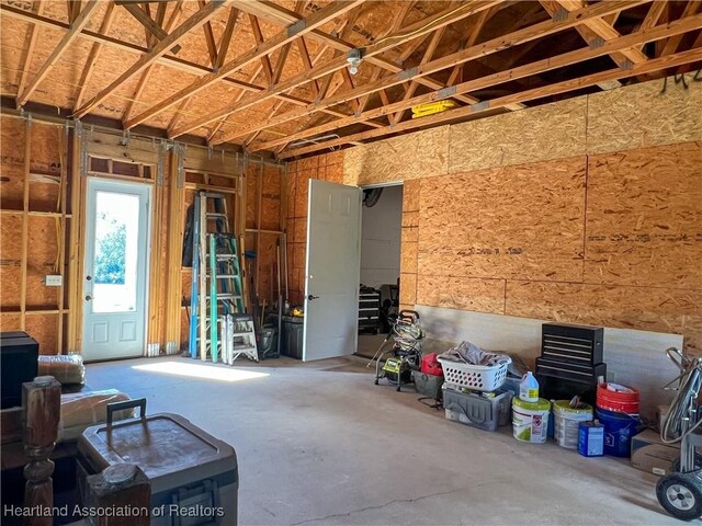 misc room with concrete flooring