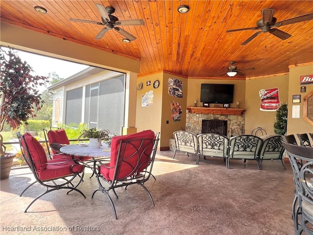 view of patio / terrace featuring ceiling fan