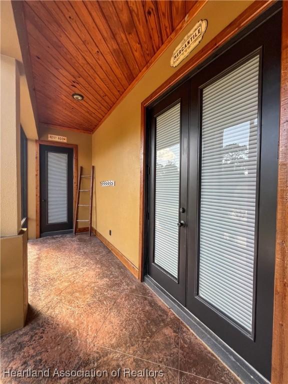 doorway to property featuring french doors