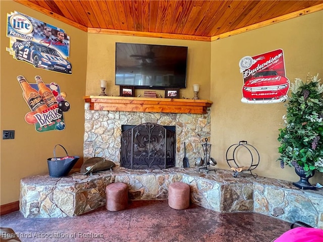 living room featuring a fireplace, wooden ceiling, and ornamental molding