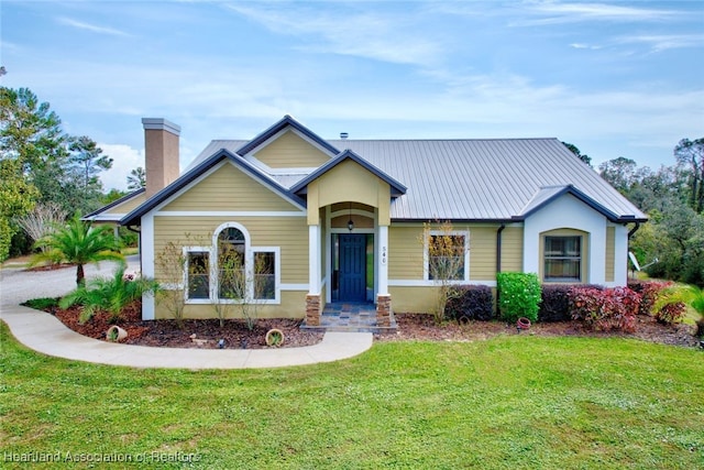 view of front of house with a front lawn