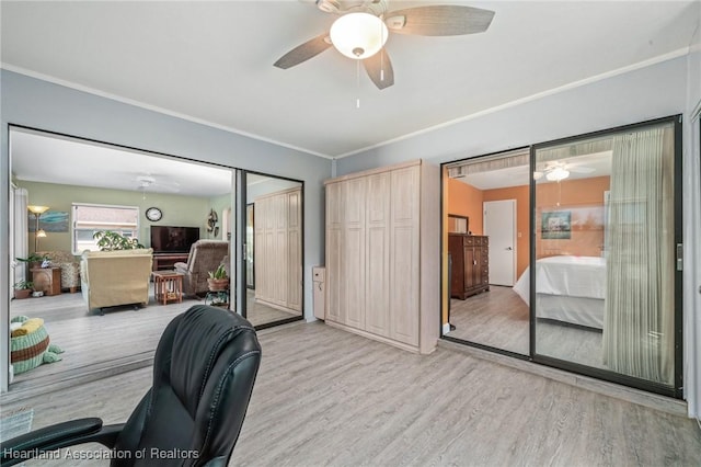 office with light wood-type flooring