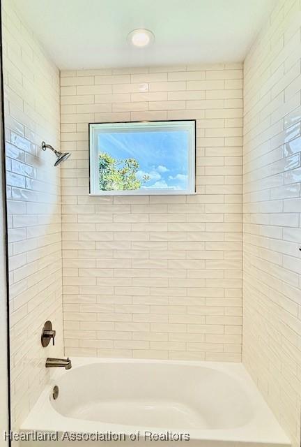 5279 Pebble Dr, Sebring, FL 33872 - bathroom with shower / washtub combination