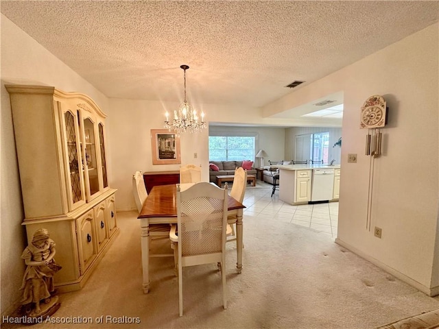 1704 Palm St, Sebring, FL 33870 - dining area with a textured ceiling, light colored carpet, and a chandelier