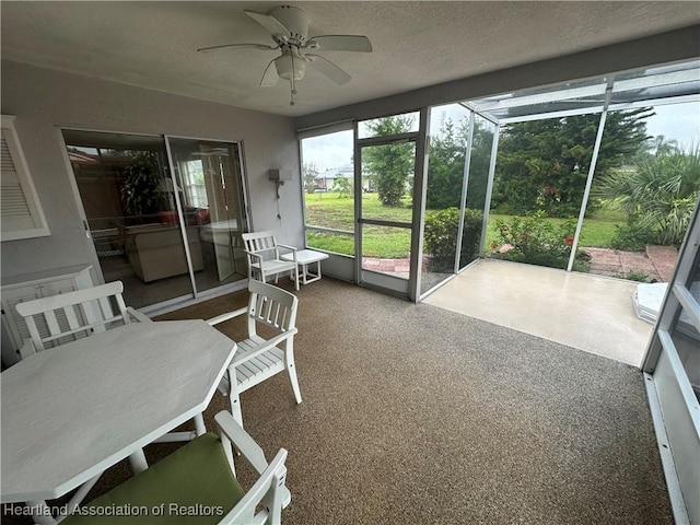 1704 Palm St, Sebring, FL 33870 - sunroom with ceiling fan and outdoor dining area