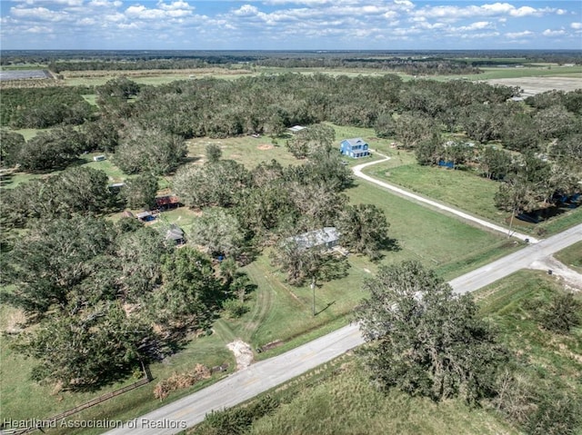 birds eye view of property featuring a rural view