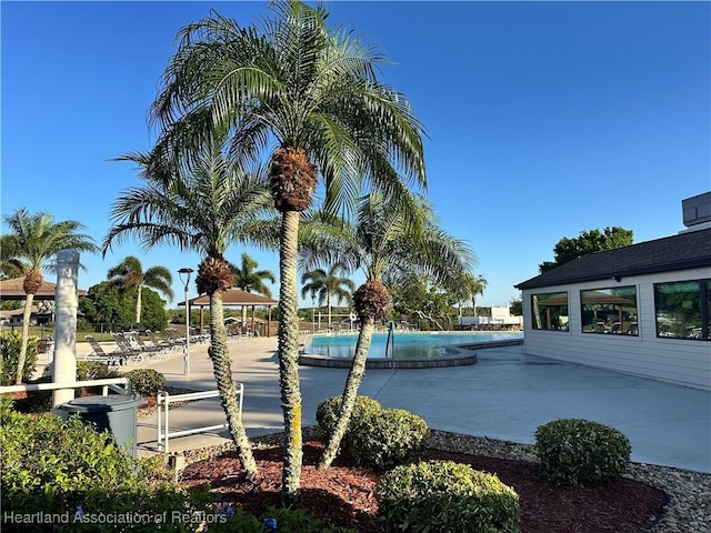 community pool featuring a gazebo