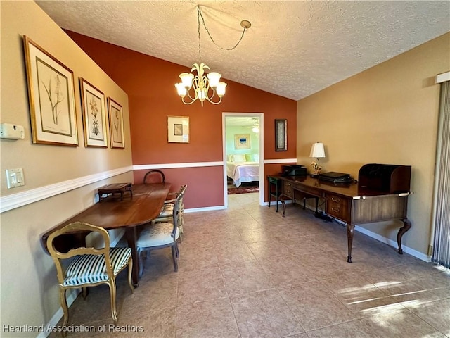 tiled dining area featuring baseboards, lofted ceiling, a textured ceiling, and a chandelier