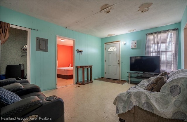 living area with tile patterned floors