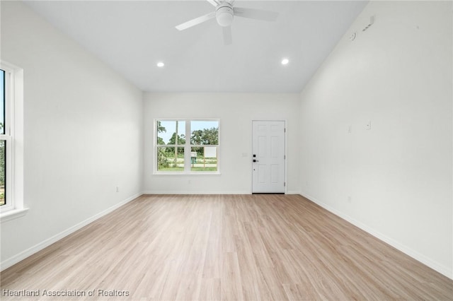 unfurnished room with light hardwood / wood-style flooring and ceiling fan