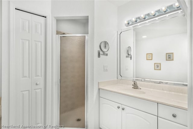 bathroom featuring vanity and walk in shower