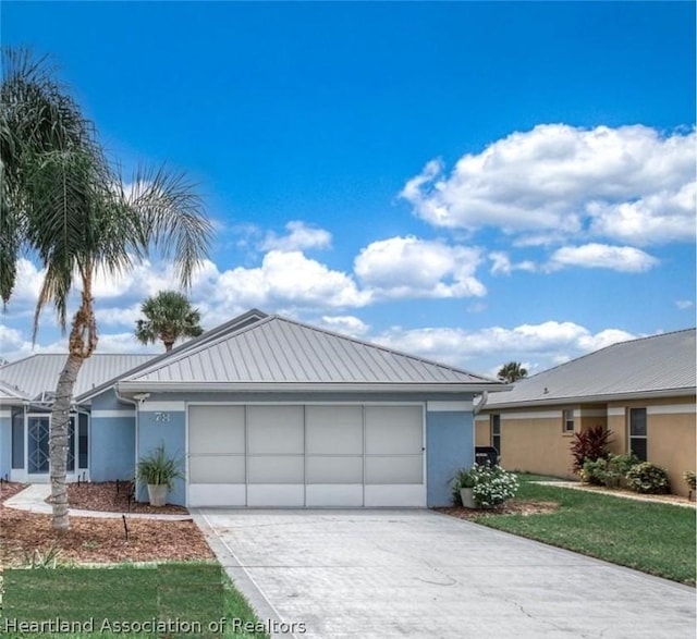 single story home with a garage