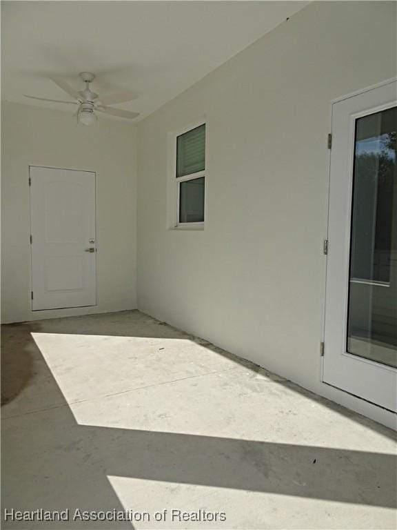 view of patio / terrace featuring ceiling fan