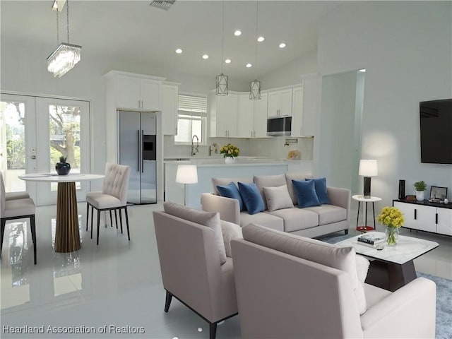 living room with vaulted ceiling, a healthy amount of sunlight, sink, and french doors