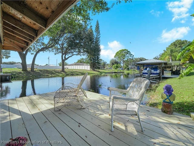 dock area featuring a water view