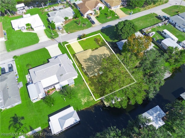 112 Eventide Ave, Lake Placid, FL 33852 - aerial view of residential area with a nearby body of water and property parcel outlined