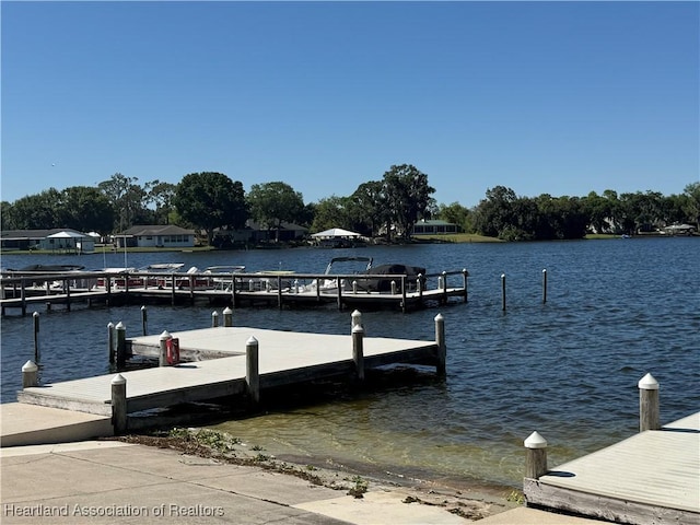 view of dock with a water view