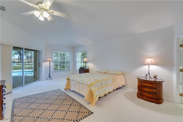 bedroom with access to exterior, multiple windows, visible vents, and carpet flooring