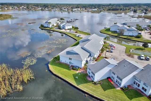 bird's eye view with a water view