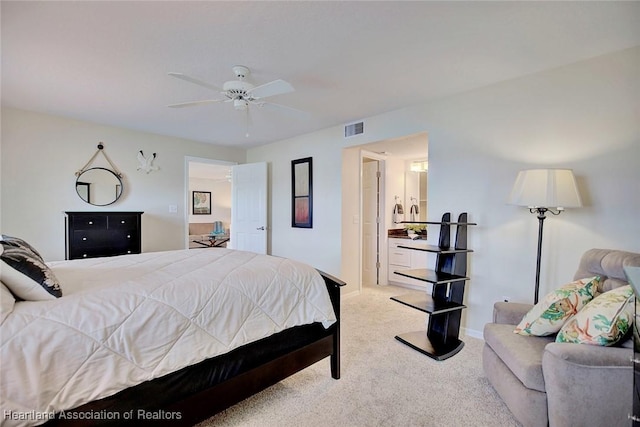 bedroom with ceiling fan and carpet floors