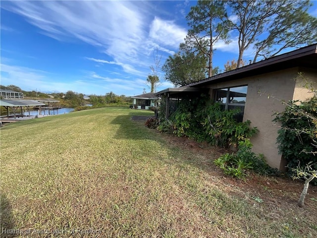 view of yard featuring a water view