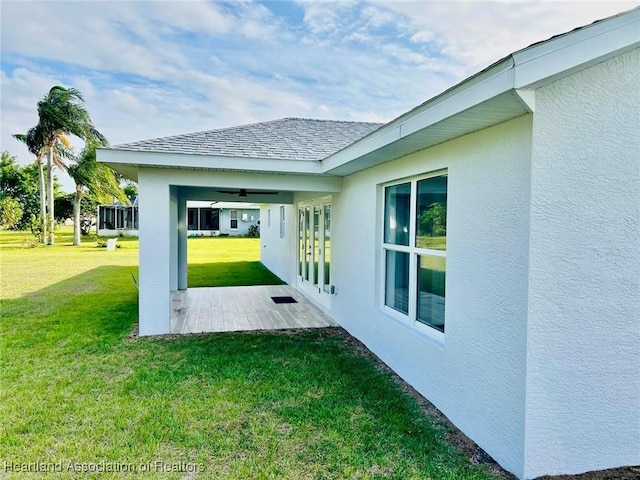 1015 Duane Palmer Blvd, Sebring, FL 33876 - view of green lawn with ceiling fan