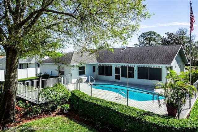 view of pool featuring a fenced in pool, a patio area, and fence