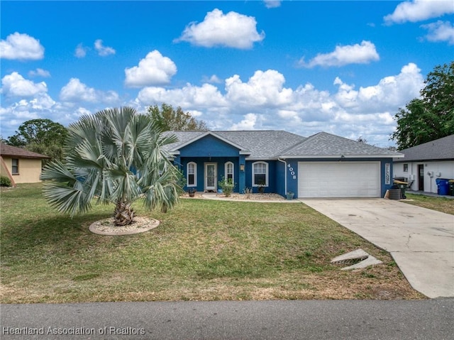 ranch-style house with a garage, a front lawn, concrete driveway, and roof with shingles