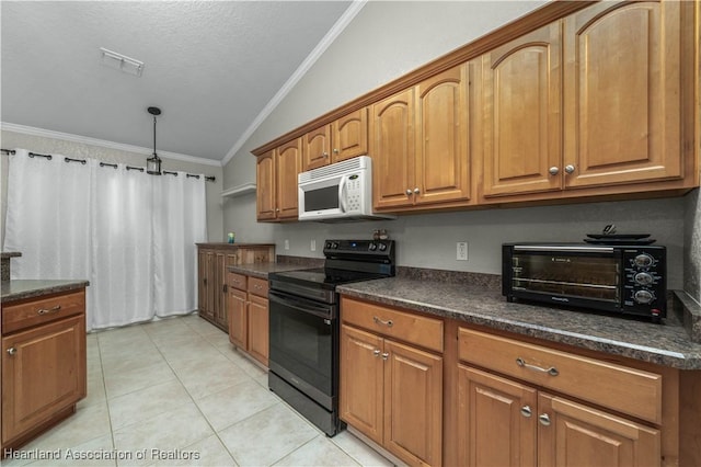 kitchen featuring dark countertops, white microwave, ornamental molding, brown cabinets, and black range with electric cooktop