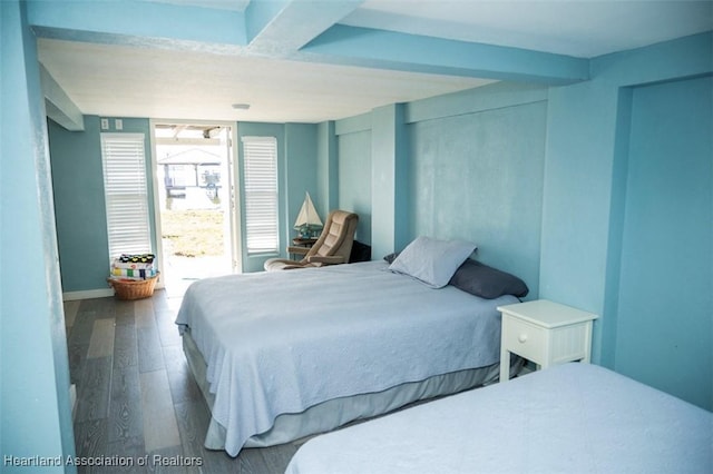 bedroom with wood finished floors